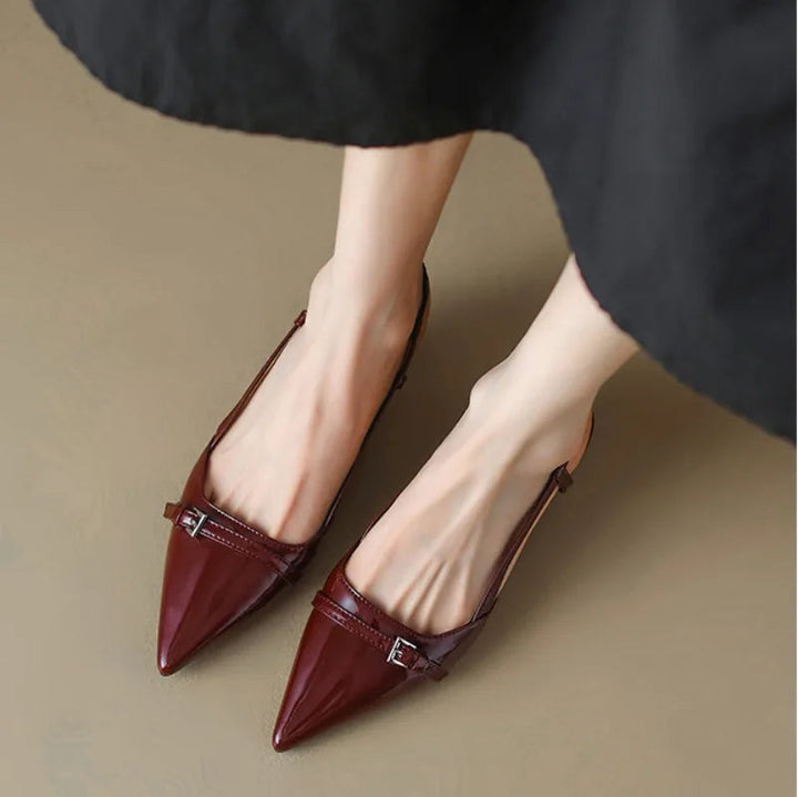Stylish burgundy women's kitten heels, featuring a pointed toe and comfortable slingback design.