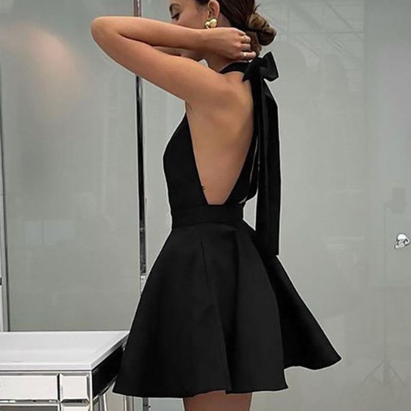 Sophisticated black satin A-line dress with a flattering flare, ideal elegant evening wear.