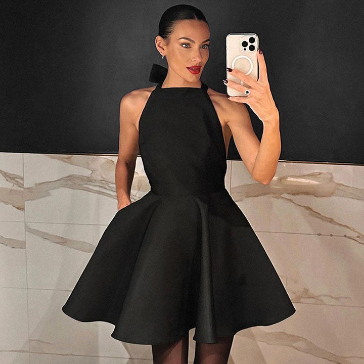 Chic black satin flared cocktail dress, a stunning A-line design for women's evening occasions.