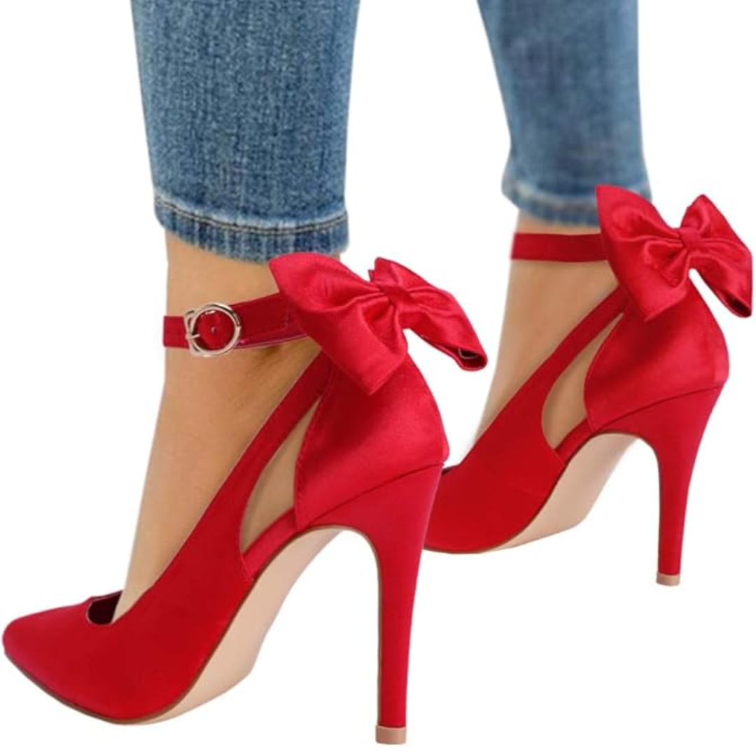 Fashionable women's high heels with pointed toe, stiletto heel, and charming ankle bow accent.