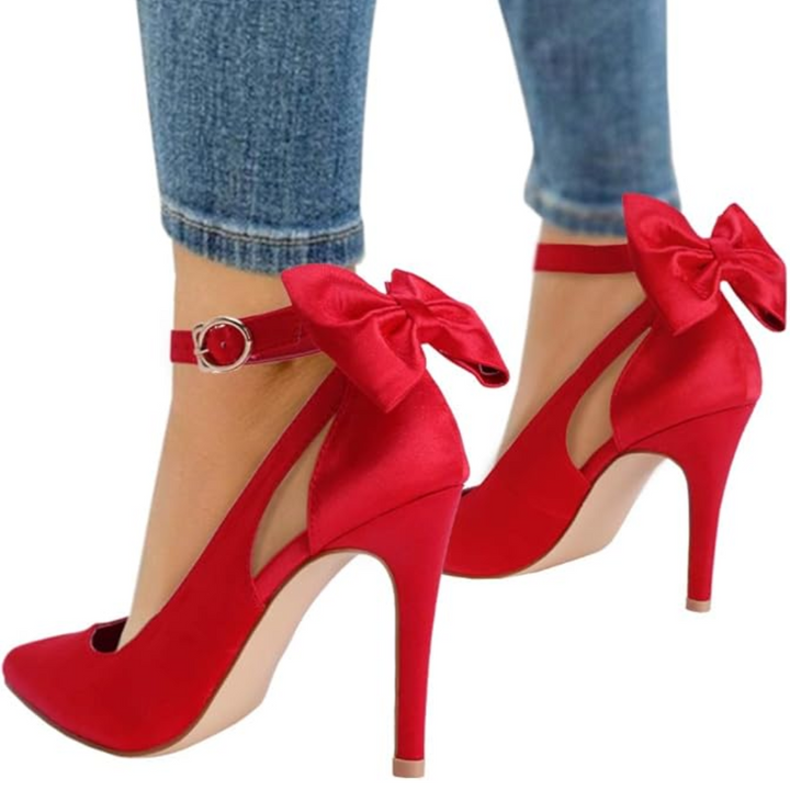 Fashionable women's high heels with pointed toe, stiletto heel, and charming ankle bow accent.