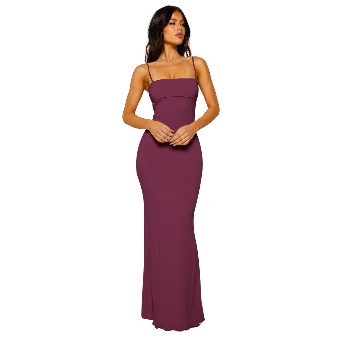 Stunning strapless bandeau maxi dress. Women's elegant backless evening gown.