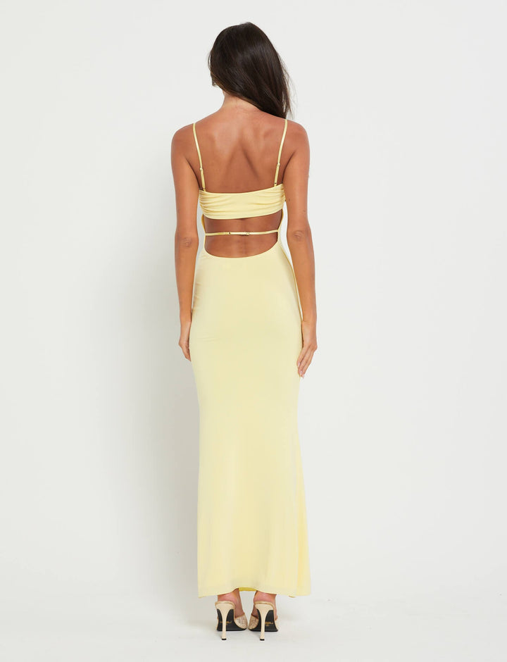Glamorous women's strapless bandeau evening gown. Flowing backless maxi dress for parties.