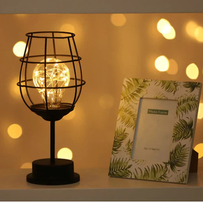 Luxe LumiGris black metal table lamp with fabric shade, perfect for modern interior design.
