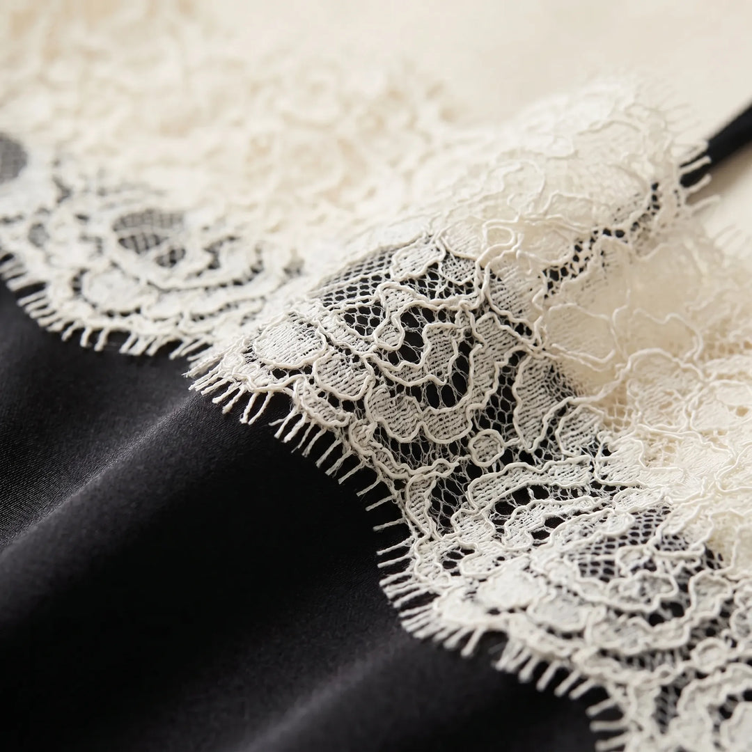 Women's versatile camisole with exquisite lace trim, a chic sleeveless top perfect for layering.