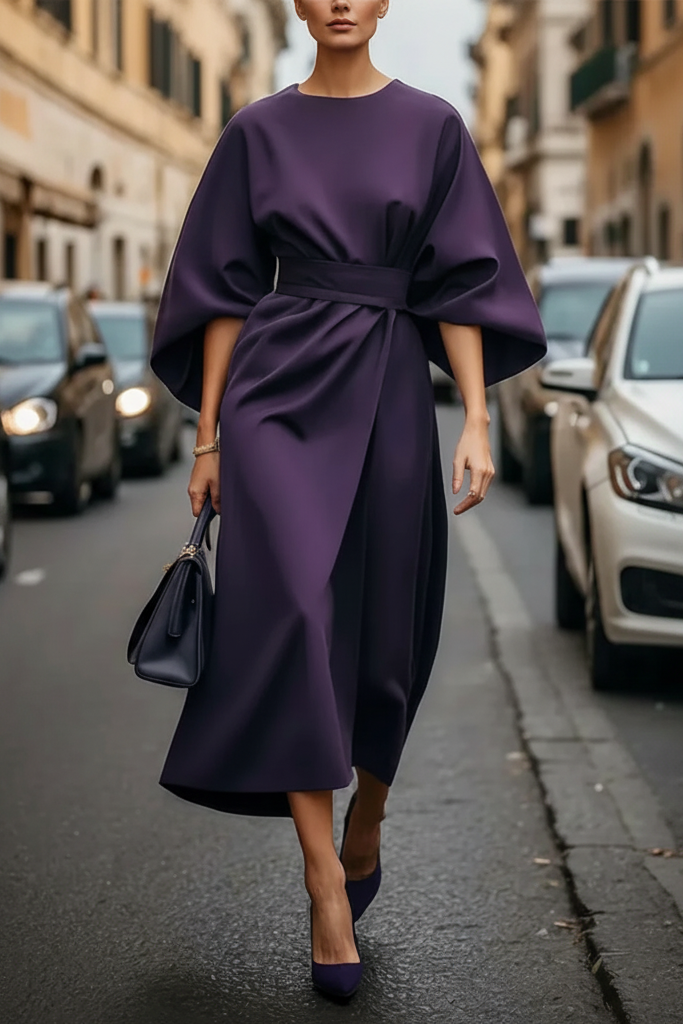 Women's elegant cocktail dress, a perfect wedding guest outfit or party gown.