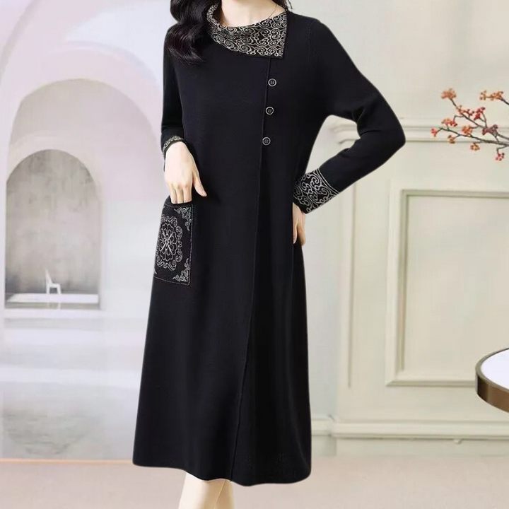 Elegant black women's knitted midi dress, long sleeve, warm & comfortable for versatile winter styling.