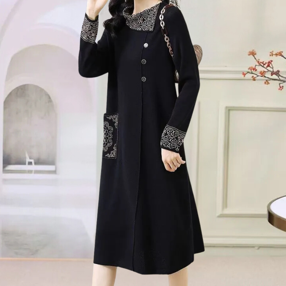 Woman wearing elegant black knitted midi dress. Versatile for casual or formal winter outfits.