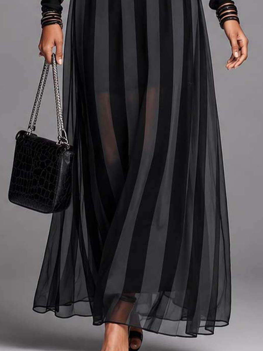 Formal black maxi dress for women with elegant sheer sleeves & belt. A chic long gown for evening parties & galas.