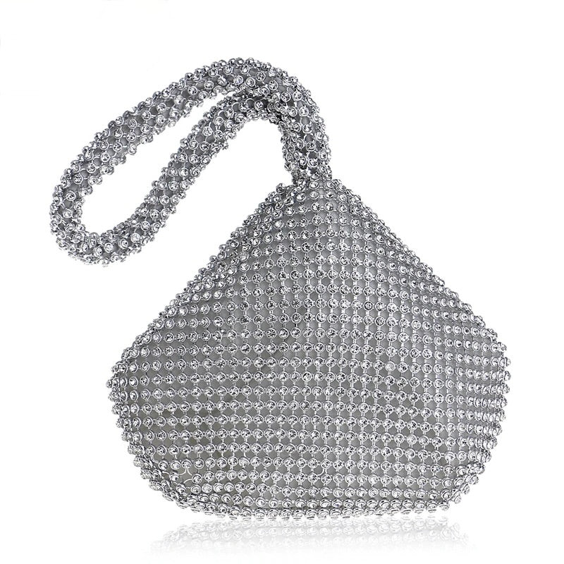 Elegant black women's mini crossbody purse with a gold chain strap, perfect for stylish looks.