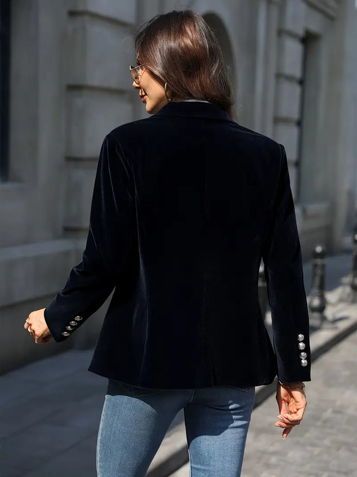 Professional black tailored blazer for women, gold button closure, ideal for business or smart casual.