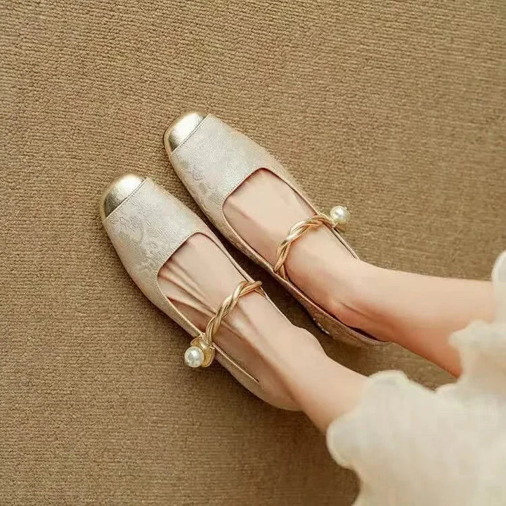 Elegant women's footwear: square toe pumps with a bold studded heel, suitable for various formal settings.