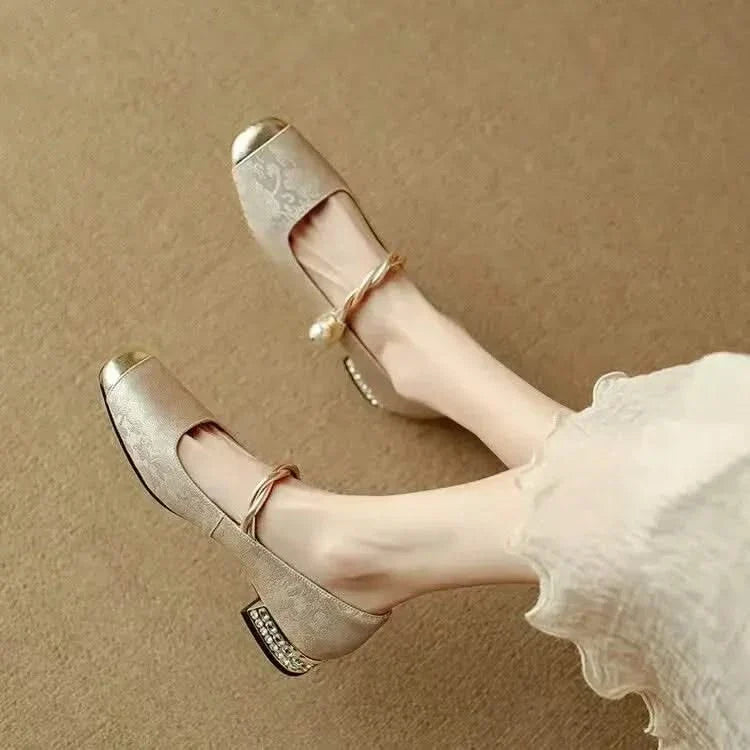 Versatile women's black pumps: elegant square toe & chic studded heel, ideal for office or evening events.