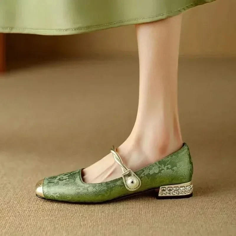 Women's formal square toe pumps with an eye-catching studded heel, adding elegance to any outfit.