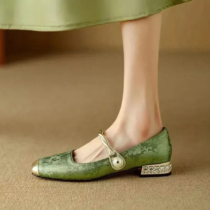 Women's formal square toe pumps with an eye-catching studded heel, adding elegance to any outfit.