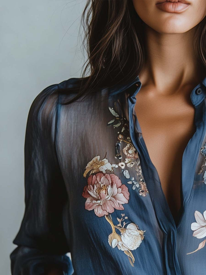 Relaxed fit women's blue embroidered shirt with stylish sheer long sleeves and a chic V-neck.
