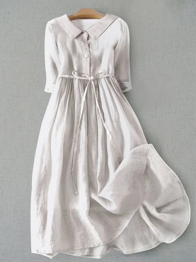 Comfortable white midi dress for women, featuring a lace-up detail and half sleeves, ideal for versatile summer style.