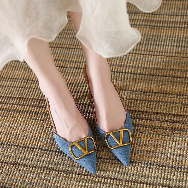 Fashionable blue Valentina pointed toe slingback stiletto heels with an elegant adjustable ankle strap.