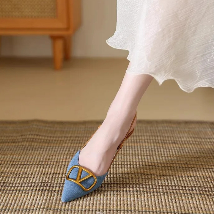 Women's Valentina blue stiletto slingback heels, pointed toe, luxury dress shoes for elegant evening wear.