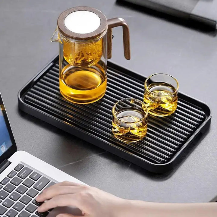 Premium borosilicate glass teapot with a removable infuser, designed for effortless loose leaf tea brewing.
