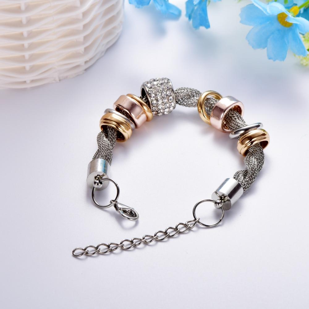 Close-up of a women's rose gold braided bracelet, highlighting intricate fashion jewelry design.