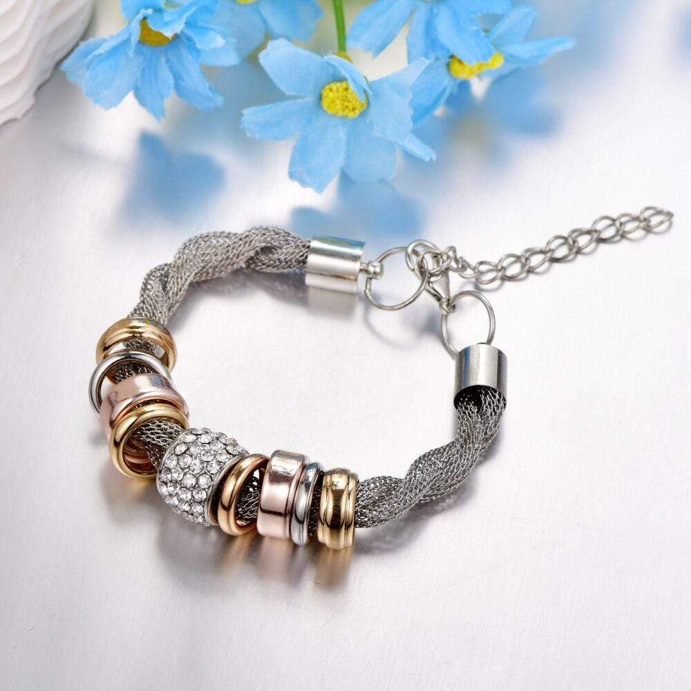 Chic braided gold women's bracelet, stylish and elegant accessory
