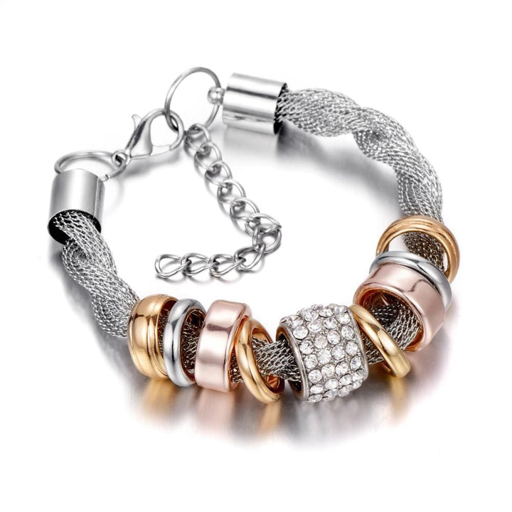 Woman's wrist adorned with a braided fashion bracelet, elegant and versatile accessory