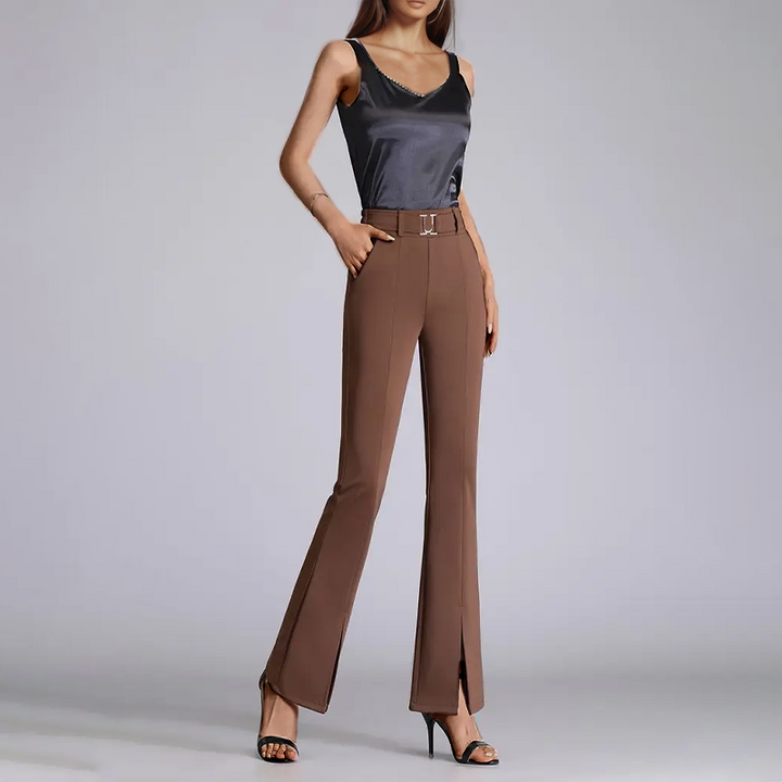 Eco-friendly green flared trousers for women. Chic sustainable fashion, ideal for elegant office or casual outfits.