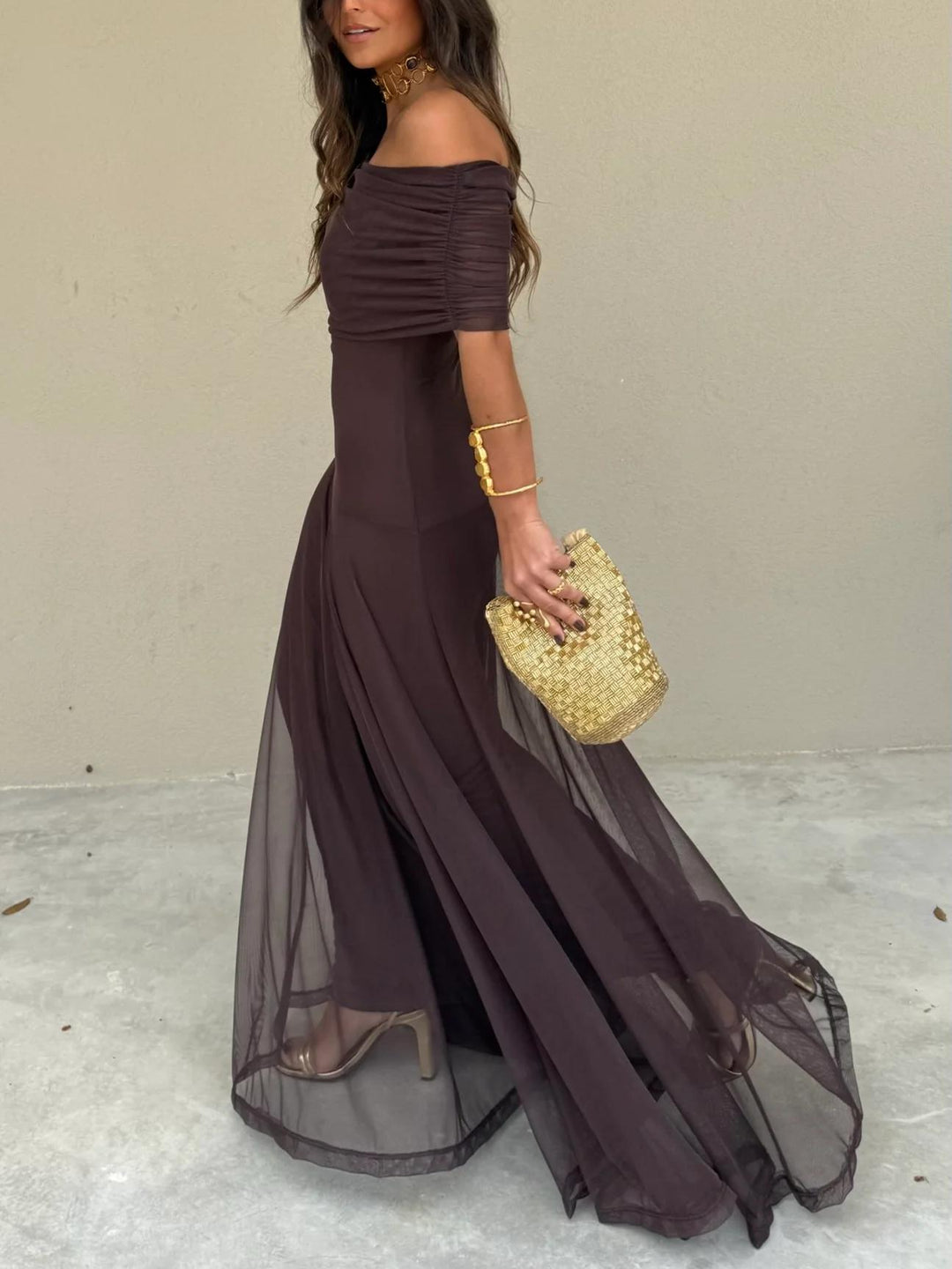 Sophisticated women's off-shoulder A-line maxi dress in brown, a stylish and elegant evening gown.