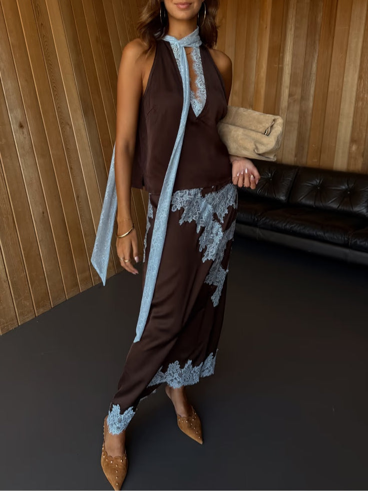 Elegant women's tie-dye halter neck maxi dress in brown, with a chic side slit for evenings.