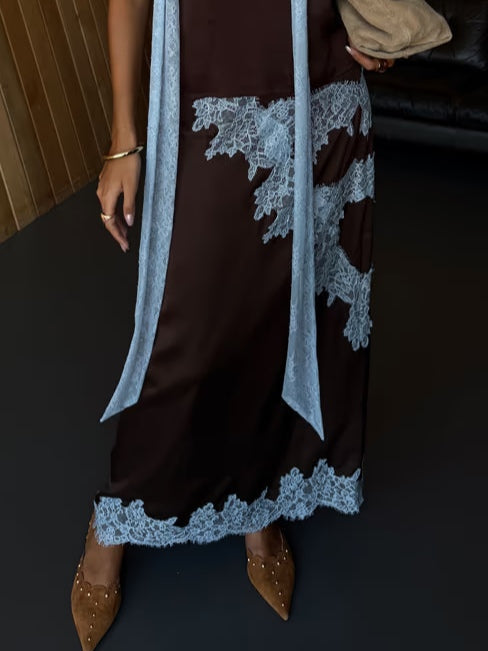 Halter neck brown tie-dye maxi dress with a flowing silhouette & side slit, elegant for women.