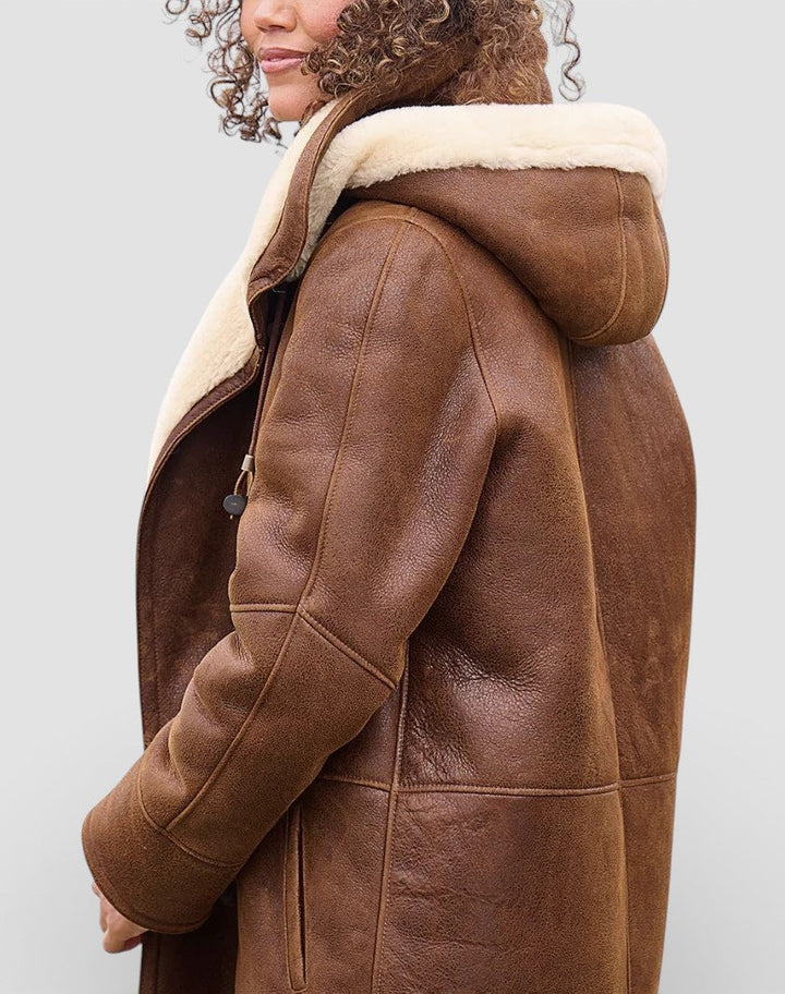 Timeless brown women's winter coat, a warm and elegant long jacket, perfect for a sophisticated cold-weather look.