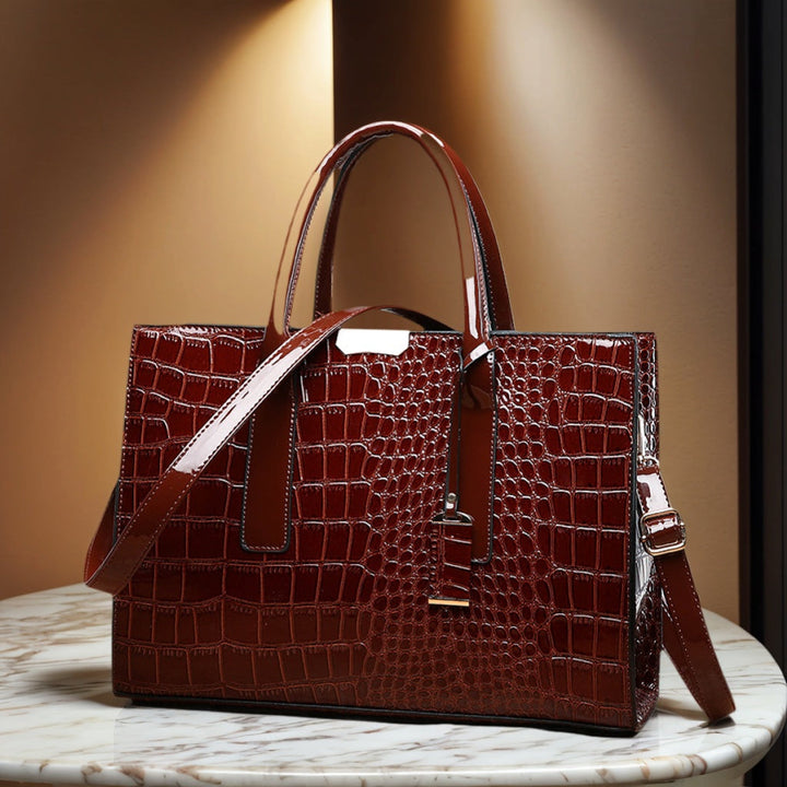 Elegant burgundy faux leather shoulder bag for women, featuring a luxurious crocodile texture and multi-pocket design.
