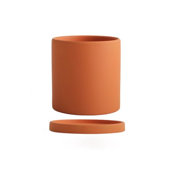 High-quality ceramic pot with saucer, promoting healthy growth for indoor plants.