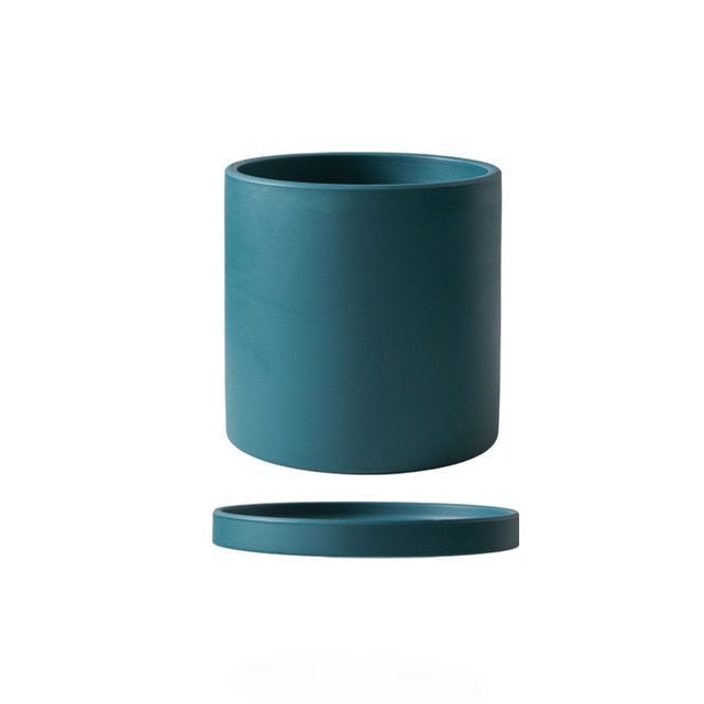 Elegant ceramic indoor plant pot, thoughtfully designed for both beauty and plant health.