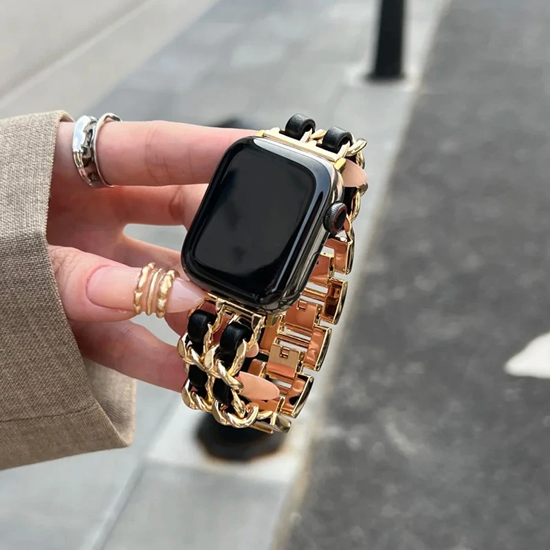 Elegant chain link metal Apple Watch band for women. Polished fashion accessory for smartwatches.