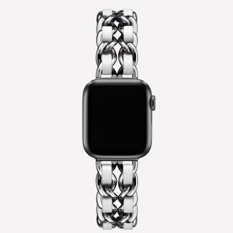 Stylish silver chain link Apple Watch band for women, polished metal elegant fashion accessory.