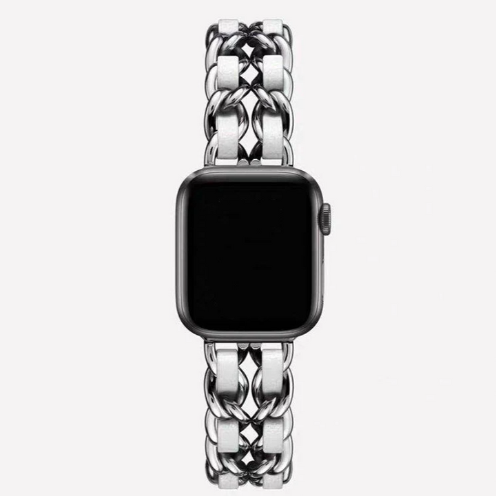 Stylish silver chain link Apple Watch band for women, polished metal elegant fashion accessory.