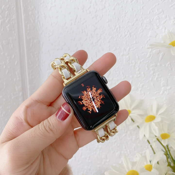 Gold elegant chain link Apple Watch band for women, luxury polished metal smartwatch strap. Fashion accessory.