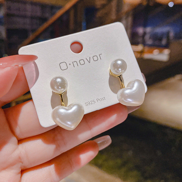 Classic circle stud earrings for women. Elegant, versatile, and timeless jewelry fashion accessory.