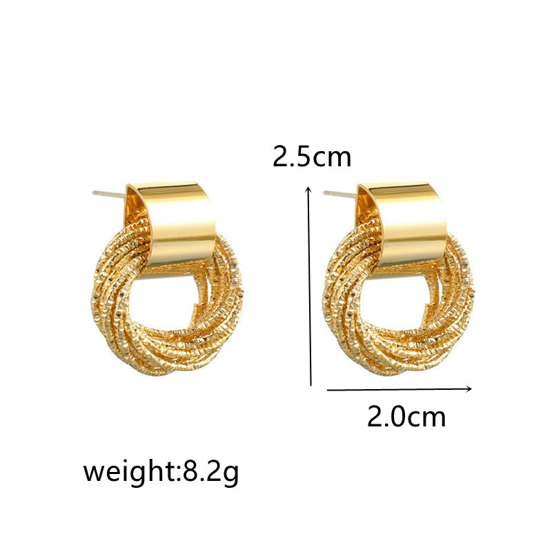 Everyday elegant circle stud earrings. Women's versatile jewelry, a polished minimalist fashion piece.