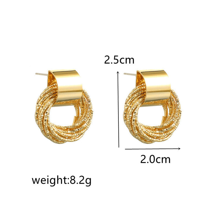 Everyday elegant circle stud earrings. Women's versatile jewelry, a polished minimalist fashion piece.