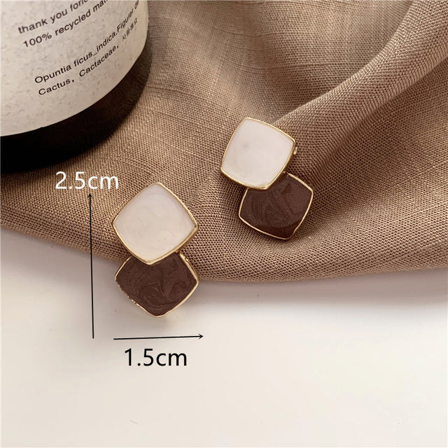 Timeless elegant circle stud earrings. Versatile women's jewelry, ideal fashion accessory for any look.