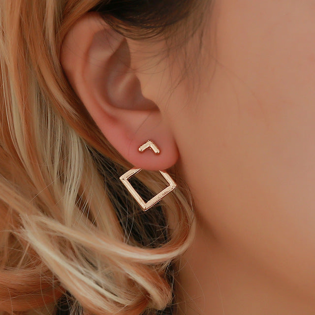 Subtle elegant circle stud earrings. Women's minimalist jewelry, perfect for a refined and timeless look.