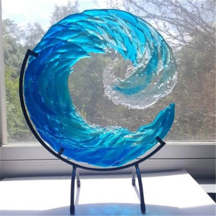 Handcrafted glass ocean wave sculpture with clear aqua tones, ideal modern home or shelf decor piece.