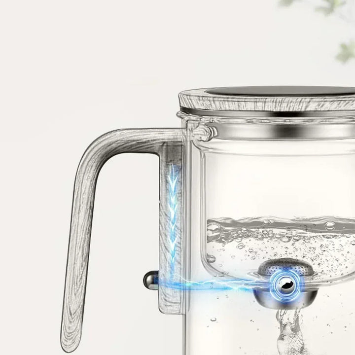 Modern glass tea brewer with fine mesh infuser, perfect for brewing hot or iced loose leaf tea.