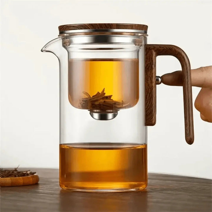 Stylish transparent glass teapot, perfect for brewing hot beverages in modern kitchens.