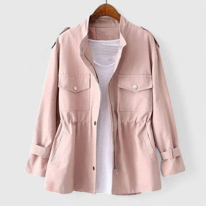 Stylish pink double-breasted overcoat for women. Classic fall/winter long coat, elegant and tailored.