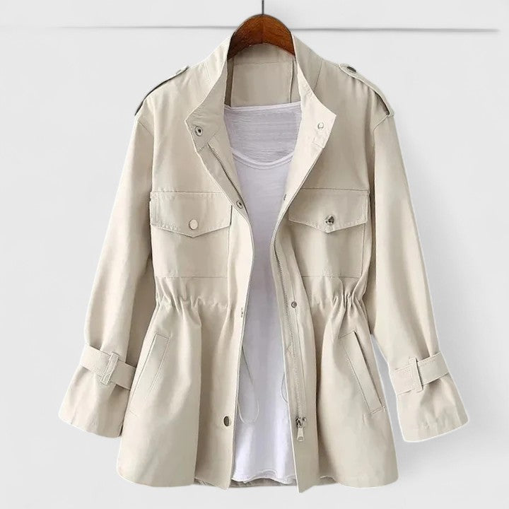 Sophisticated green women's double-breasted overcoat. Tailored long outerwear, ideal for classic fall/winter style.