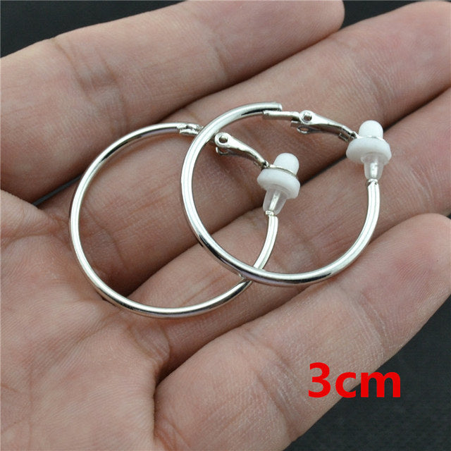 Gold elegant crystal clip-on earrings, stylish non-pierced accessory.